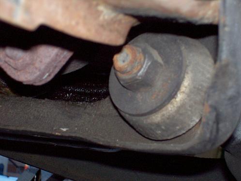 Remove the radius arm to frame bracket nut