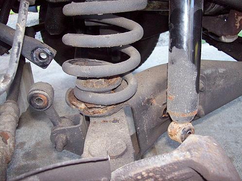 Remove the swap bar end link from the sway bar