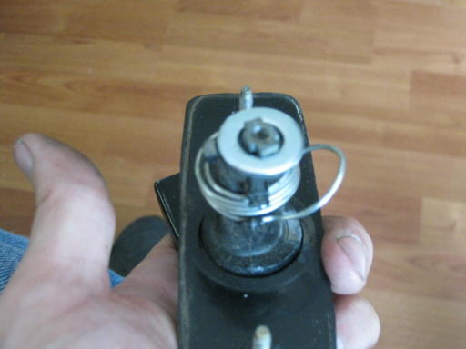 Install the washer under the arm 