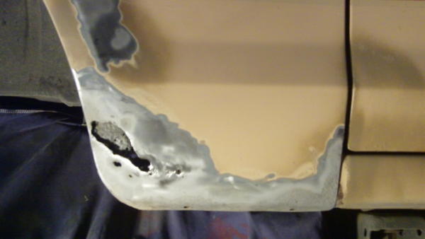 Hole rusted in fender