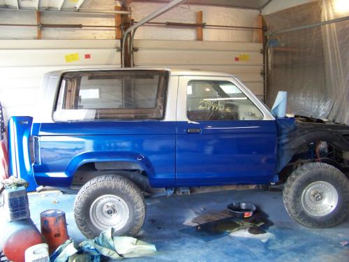 Passenger side view of new paint