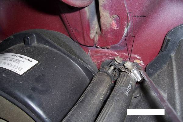 The cowl to firewall seam also goes behind the A/C